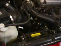 Engine bay - intake pipe on car.jpg